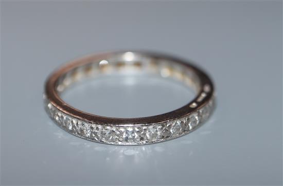 An 18ct white gold and diamond set full eternity ring, size N.